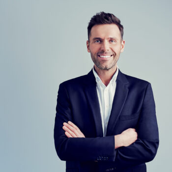 Happy,Businessman,Isolated,-,Handsome,Man,Standing,With,Crossed,Arms