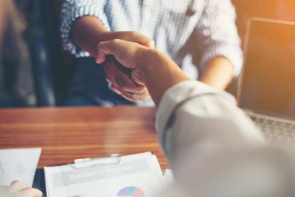 Business People Handshake Greeting Deal at work. Adult site broker closing deal on adult website with handshake